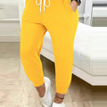 Daphne | Zwężane Spodnie dresowe z Troczkami