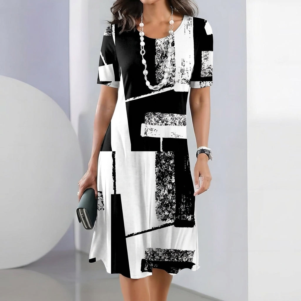 Tessa | Elegancka Midi Sukienka